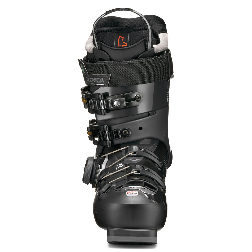 MACHBOAHV75-Black Tecnica ski boot with gold accents on a white background