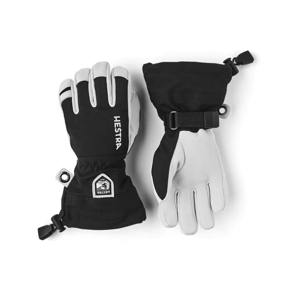 Army Leather Heli Ski Glove-Black and white gloves with Hestra logo on a transparent background
