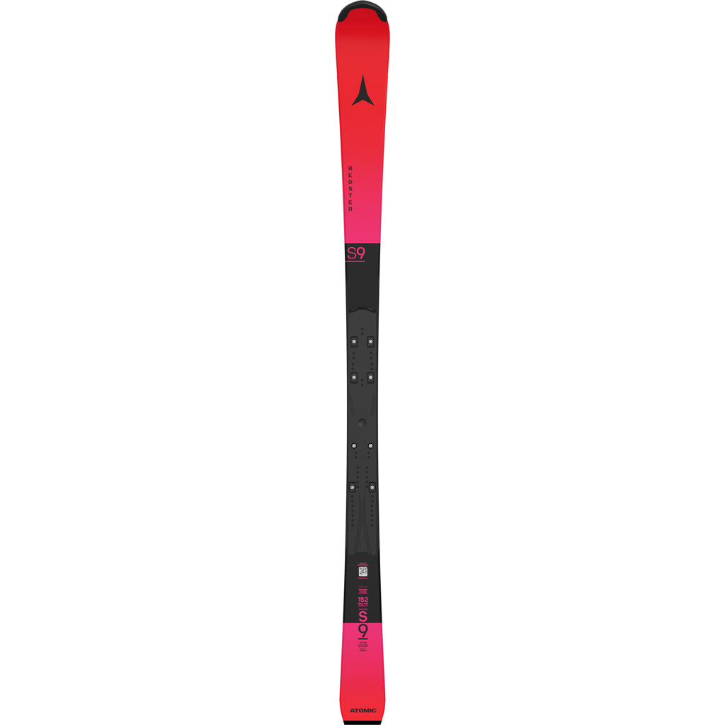RedsterS9- A pair of red and black Atomic Redster S9 FIS J-RP3 kids skis with bindings attached, displayed against a white background.
