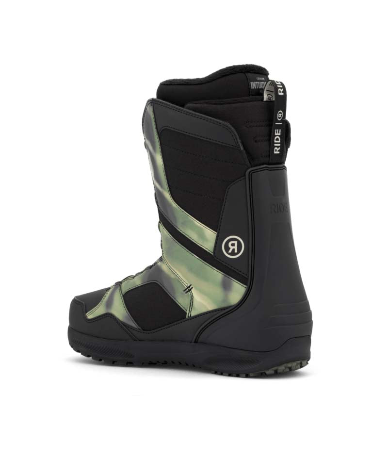 Anthem- Black and green snowboard boot on a white background