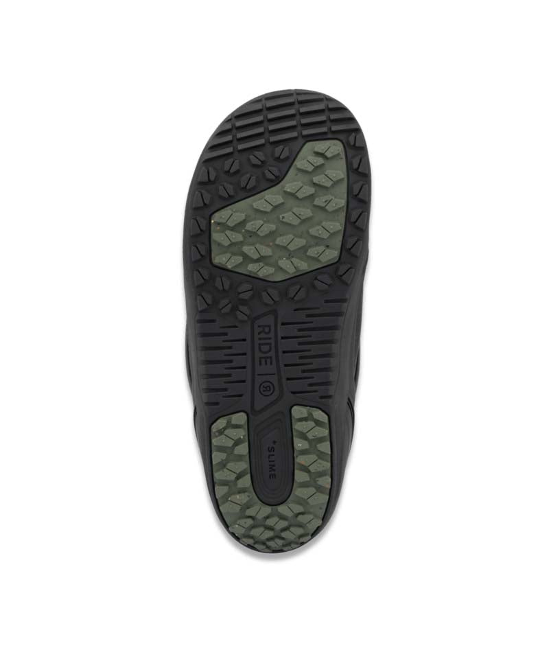 Anthem- Black and green snowboard boot on a white background