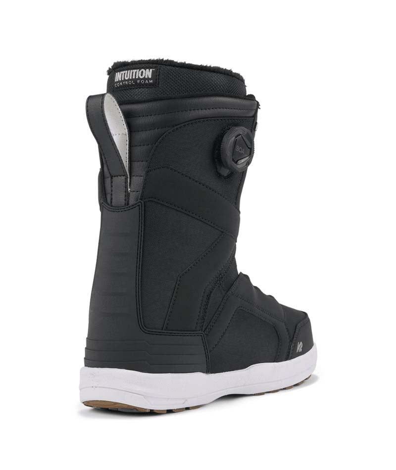 Boundary- Black snowboard boot on a white background