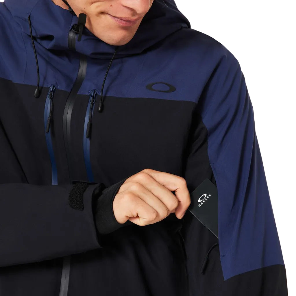 CanopyIns.ProJacket-Blue and black jacket with a brand logo on a white background