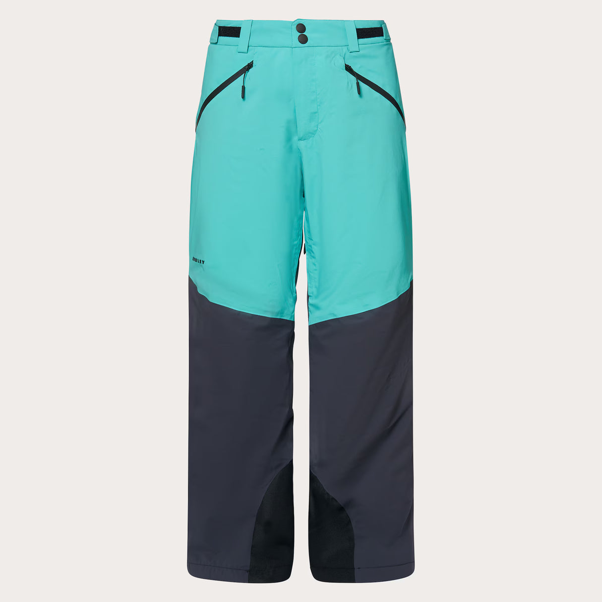 Canopy PRO Insulated Pant-Two-tone teal and navy pants on a light gray background