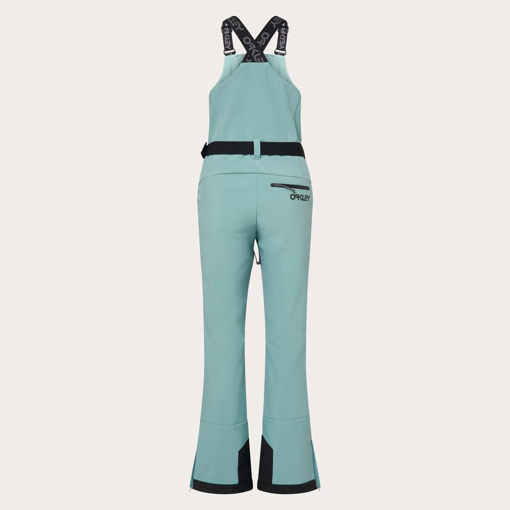 WTNPHarperSoftshellBib-Teal ski jumpsuit with a belt on a light gray background