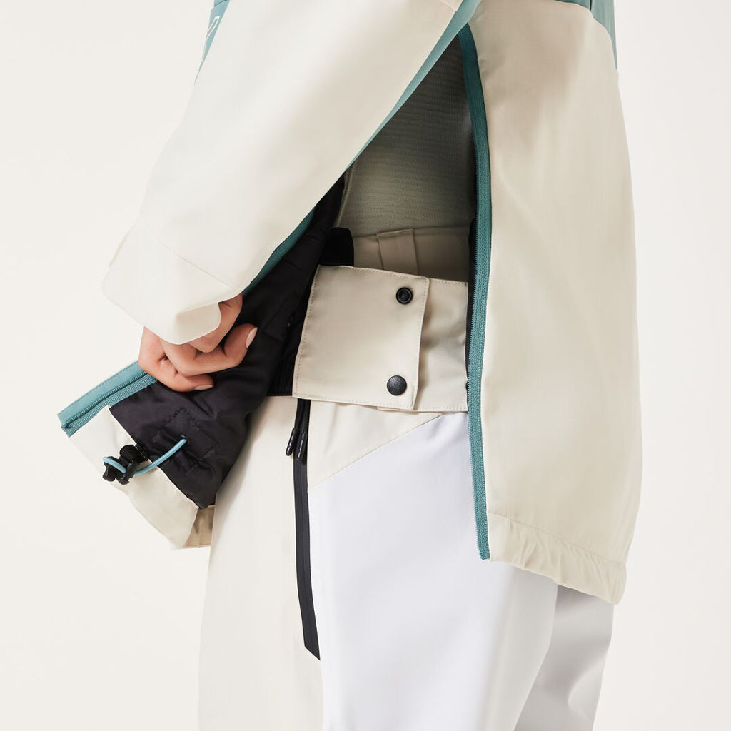 TNP TBT Insulated Anorak-Green and white jacket with Oakley logo on a light gray background