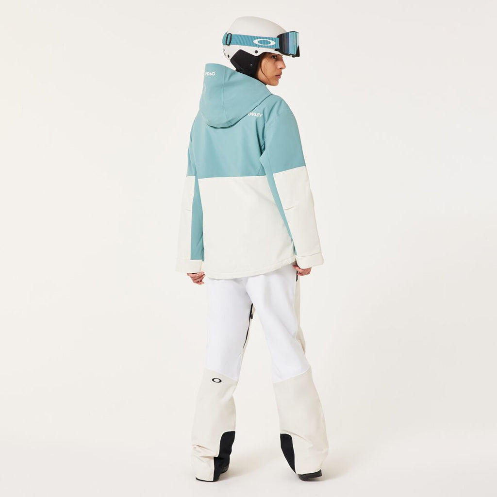 TNP TBT Insulated Anorak-Green and white jacket with Oakley logo on a light gray background