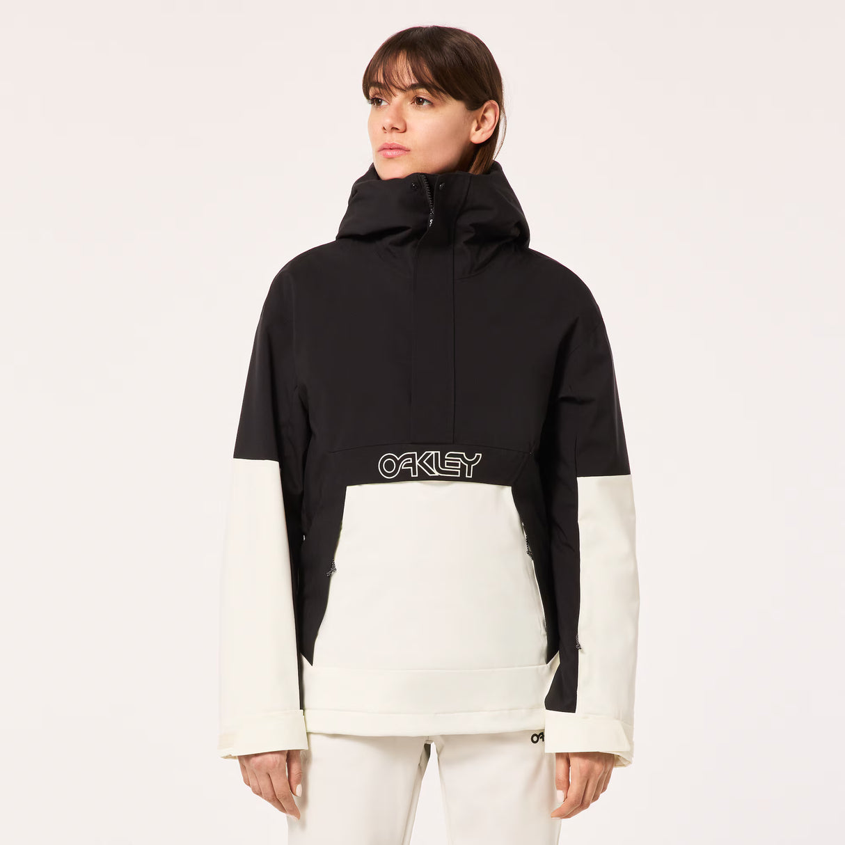 TNP TBT Insulated Anorak-Black and white jacket with Oakley logo on a light gray background