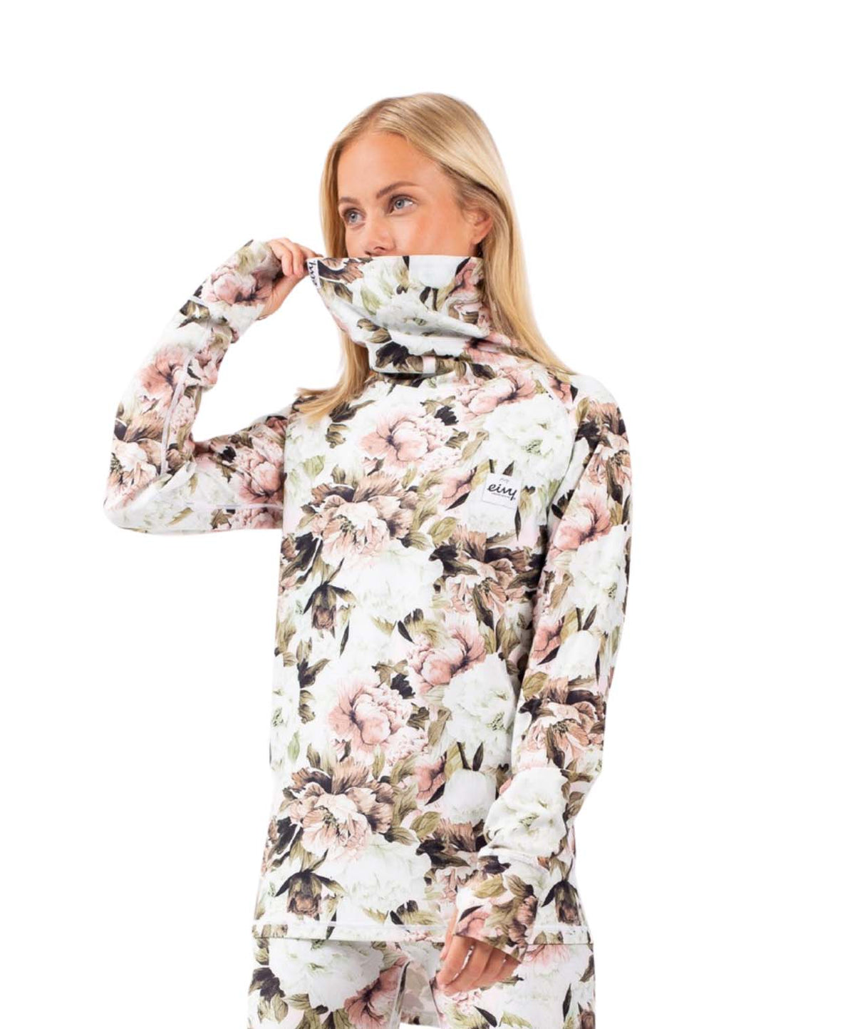 IcecoldTop- Woman wearing a floral printed high neck baselayer on a white background