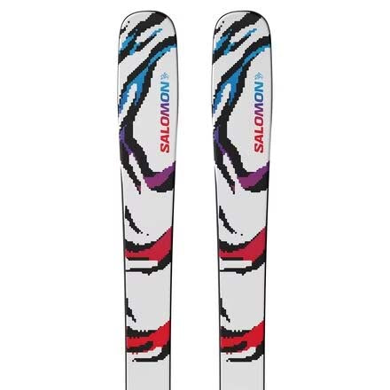 JR.QSTBLANKTEAM-A pair of Salomon skis shown vertically against a plain white background, featuring a white base with a colorful abstract pattern of black, red, purple, and blue.