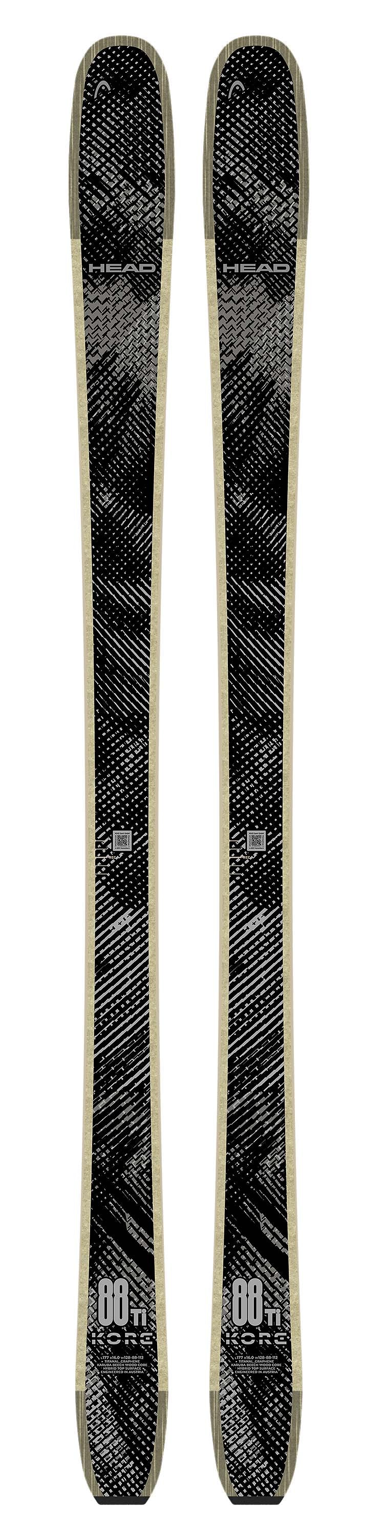 KORE88Ti- Two skis with bindings on a white background