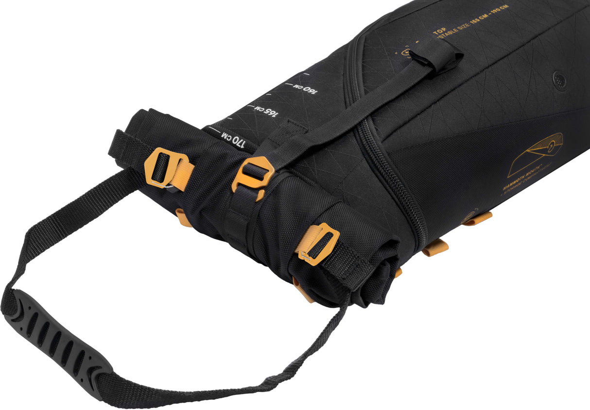 KantajaSingleRollerSkiBag- Black and gold bag on a white background