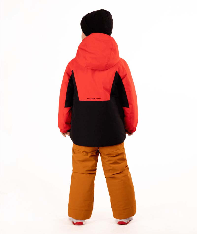 KidsReactorJacket-Child wearing a red and black jacket with orange pants on a white background