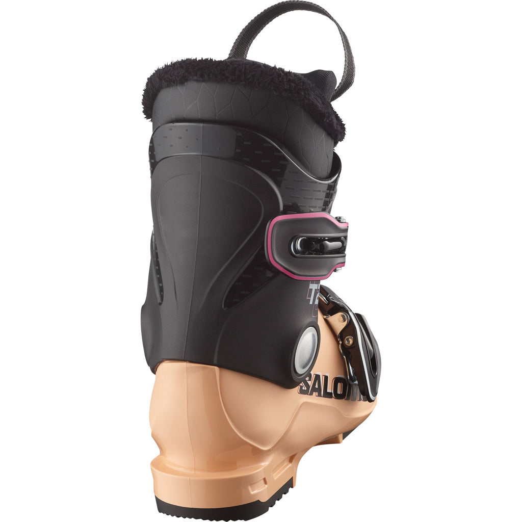 T2RT- A kid's Salomon T2 RT ski boot in beige with black straps and buckles, and a visible logo.