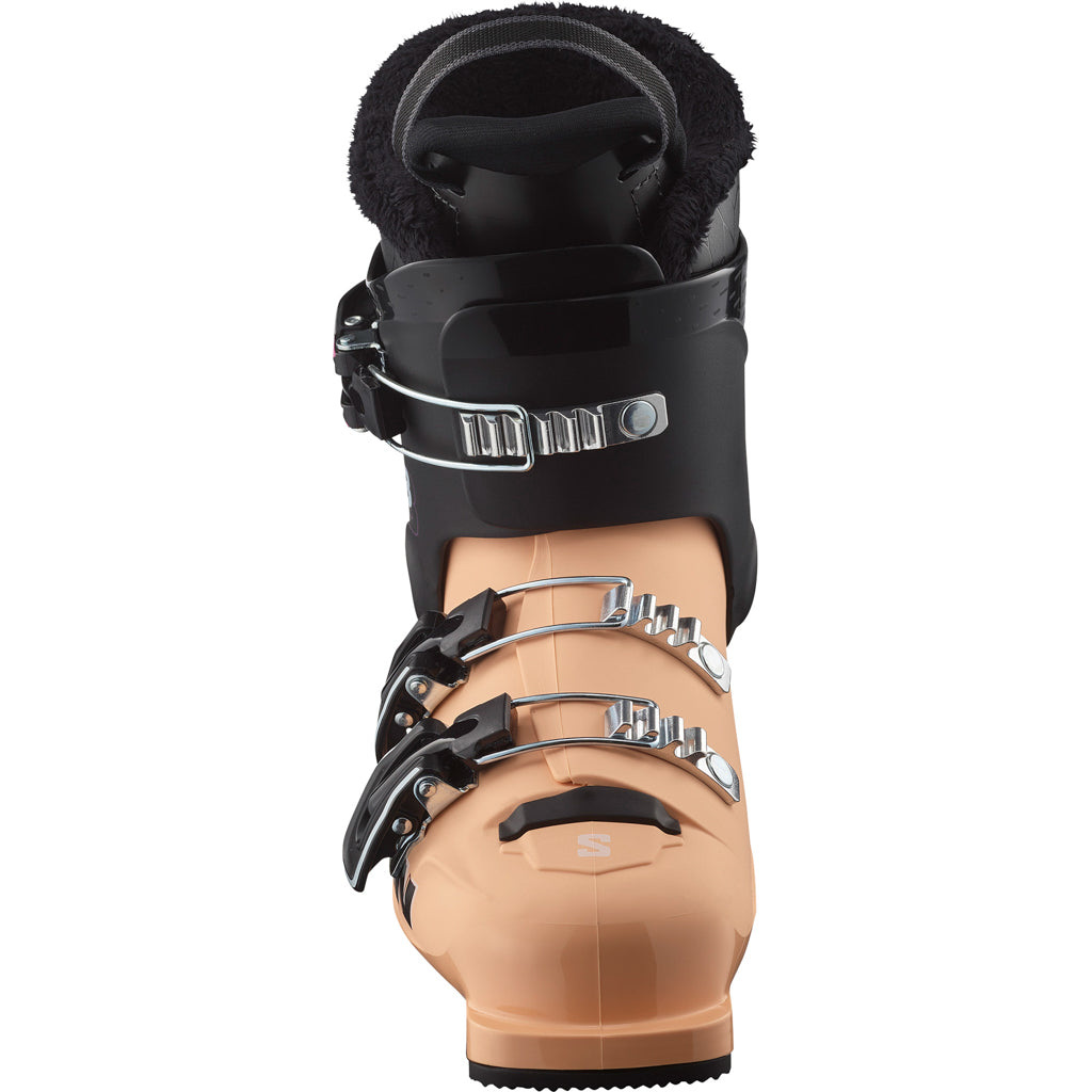 T2RT- A kid's Salomon T2 RT ski boot in beige with black straps and buckles, and a visible logo.