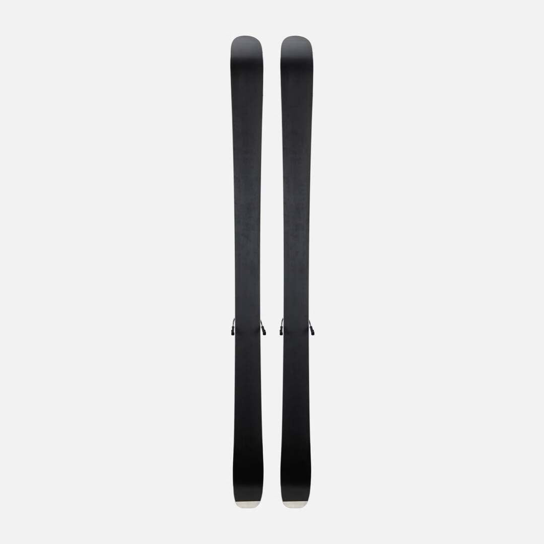 M-MENACE90XPRESS-A pair of Dynastar skis, featuring a dark blue and purple gradient design with orange accents, set against a plain light gray background.