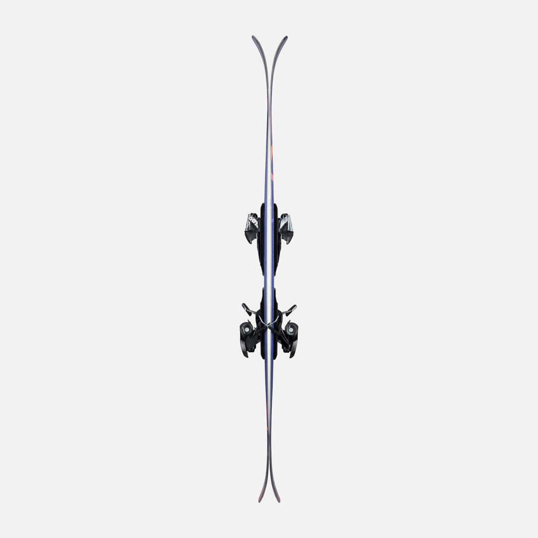 M-MENACE90XPRESS-A pair of Dynastar skis, featuring a dark blue and purple gradient design with orange accents, set against a plain light gray background.