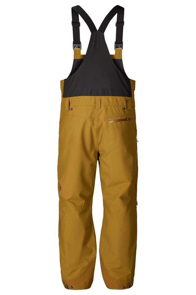 MBakerBib-Yellow bib overalls with black suspenders on a white background