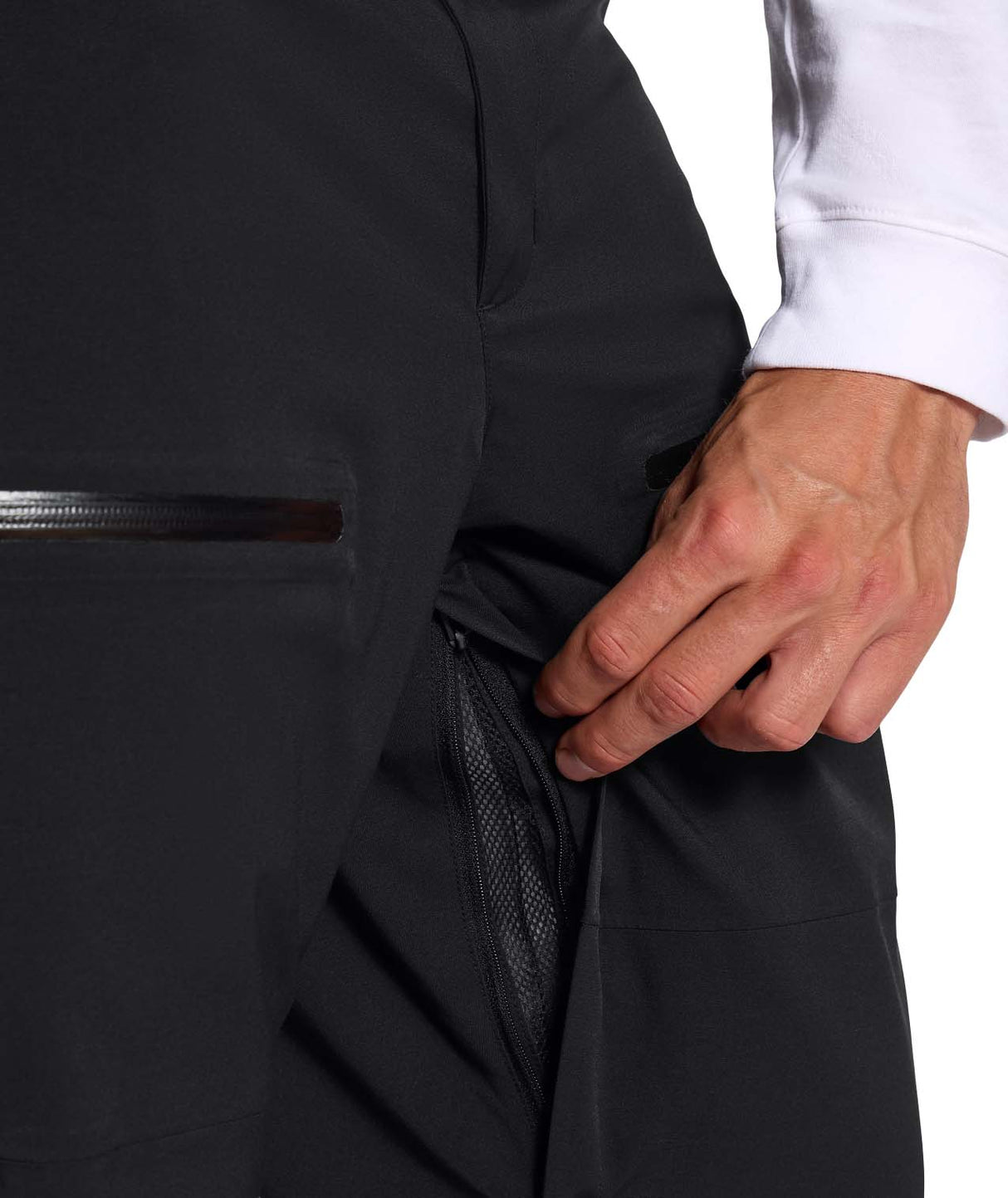 MChakalPant- Man wearing black snow pants with The North Face logo on a white background