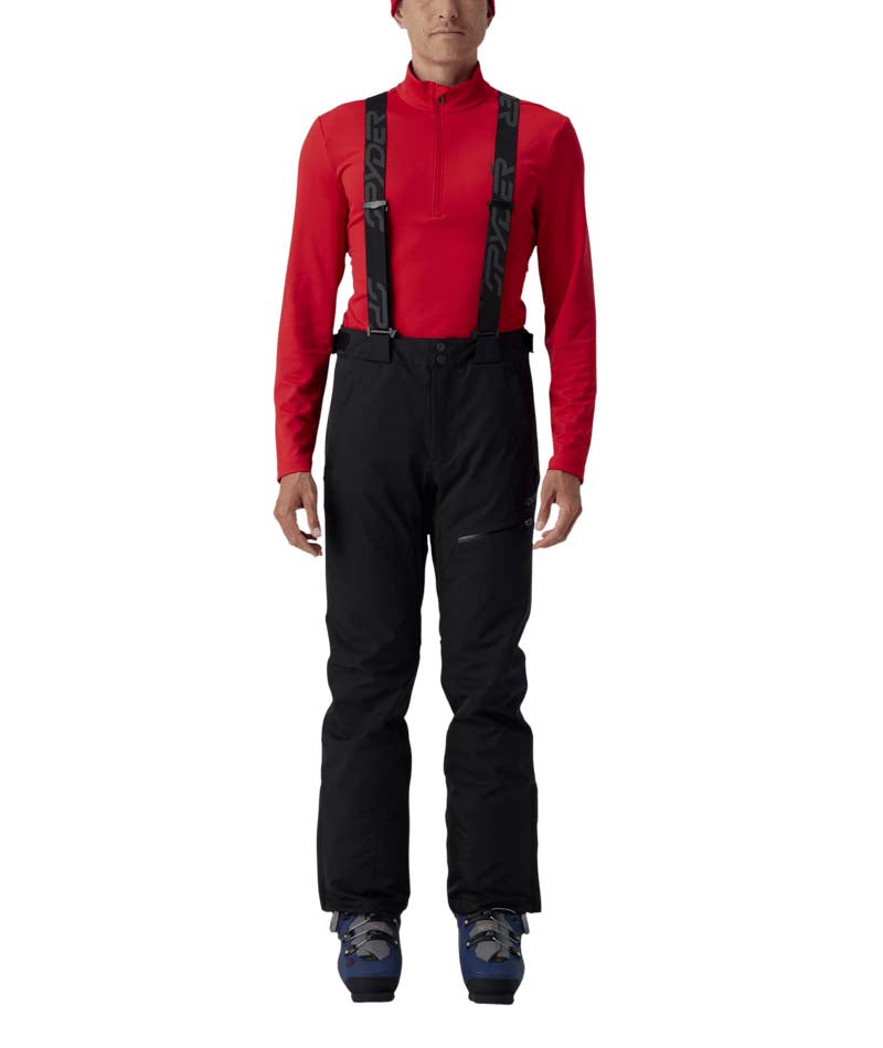 MDarePant- Man wearing black snow pants with overalls on a white background