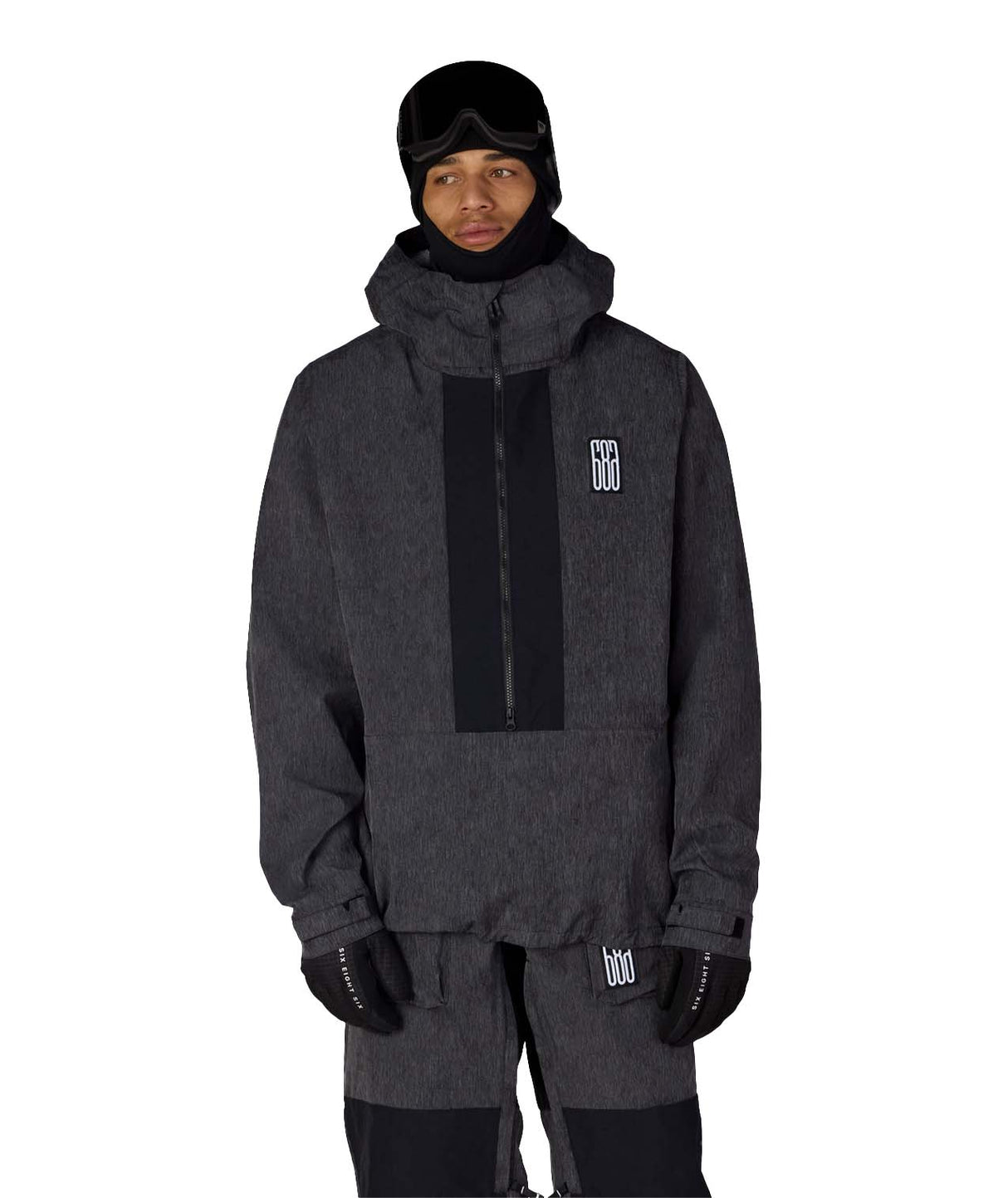MGhost2.5LAnorak-Person wearing a gray jacket, pants, and hat with a logo on a white background