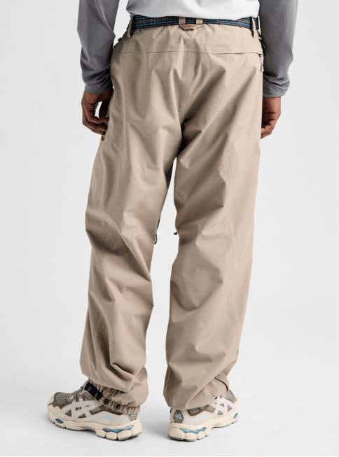 MReserve2LRelaxedPants-Beige pants with a brand logo on a white background