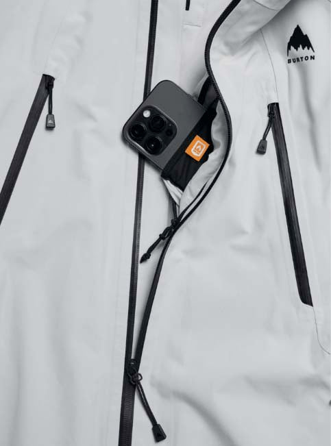 MReserveGORE-TEX2LInsulatedJacket-Light gray jacket with black zippers on a white background