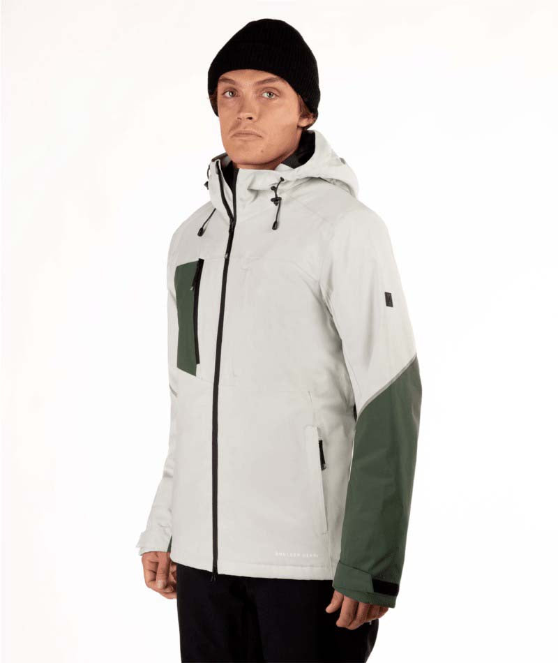 MShiftJacket-Person wearing a light gray and green jacket on a white background