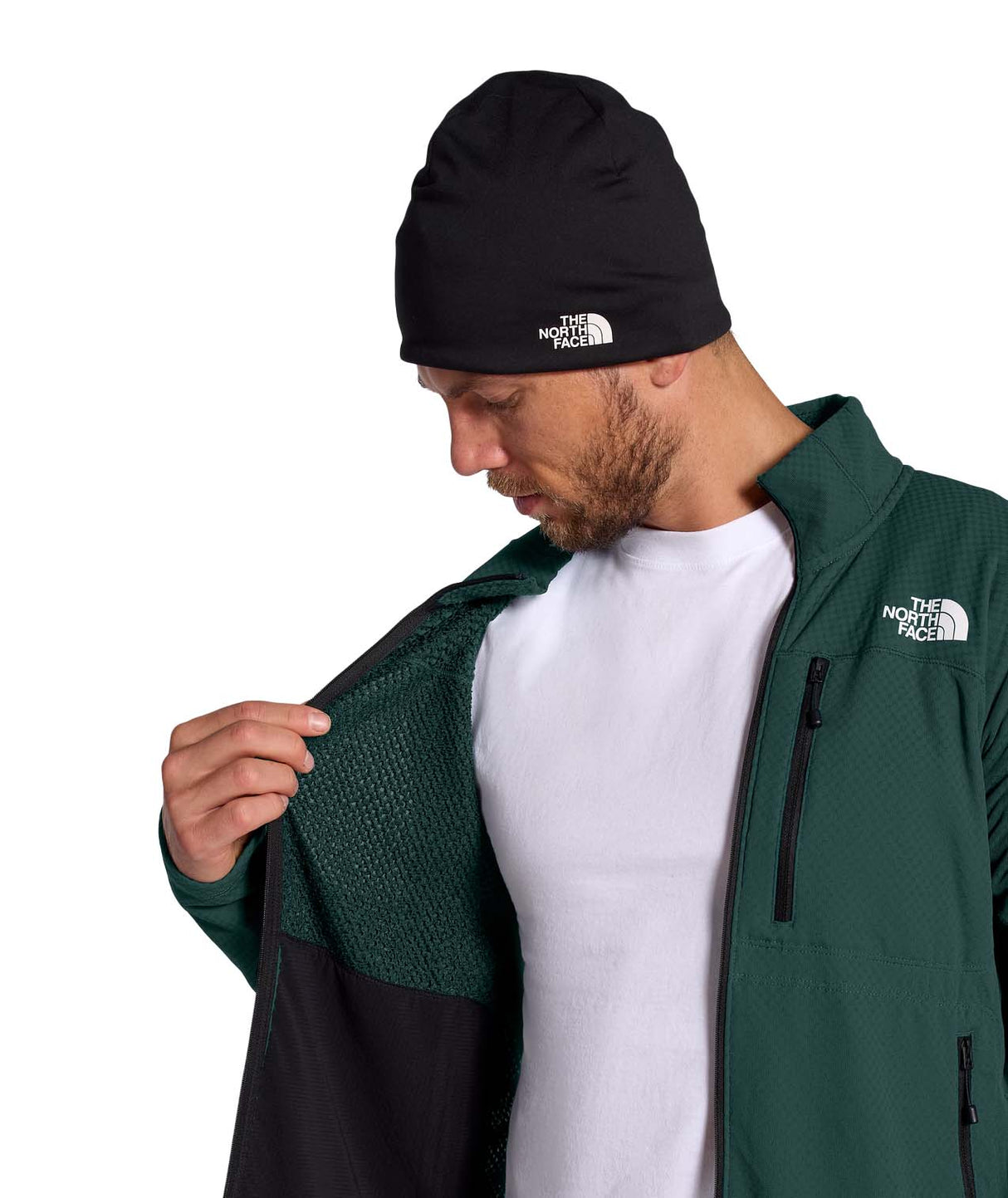 MSummitFUTUREFLEECEFullZipJacket-Person wearing a green jacket and black beanie with 'The North Face' logo on a white background