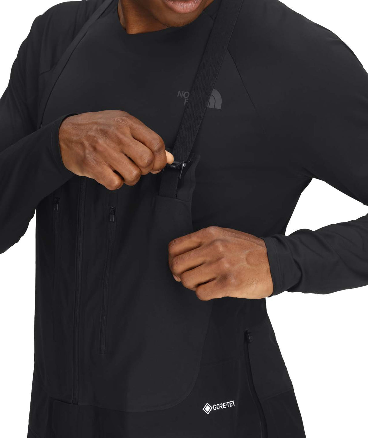 MSummitVerbierGTXBib-Person wearing a black outfit with a brand logo on a white background