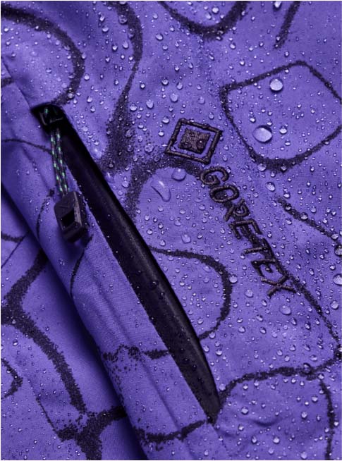 M_ak_SwashSyntheticInsulatedGORE-TEX2LJacket-Purple jacket with a geometric pattern on a white background