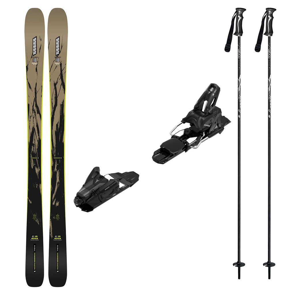 Mindbender96w_Strive14-A ski equipment set on a plain white background, including a pair of black and tan skis with yellow accents, two black ski bindings, and two black ski poles with white branding.
