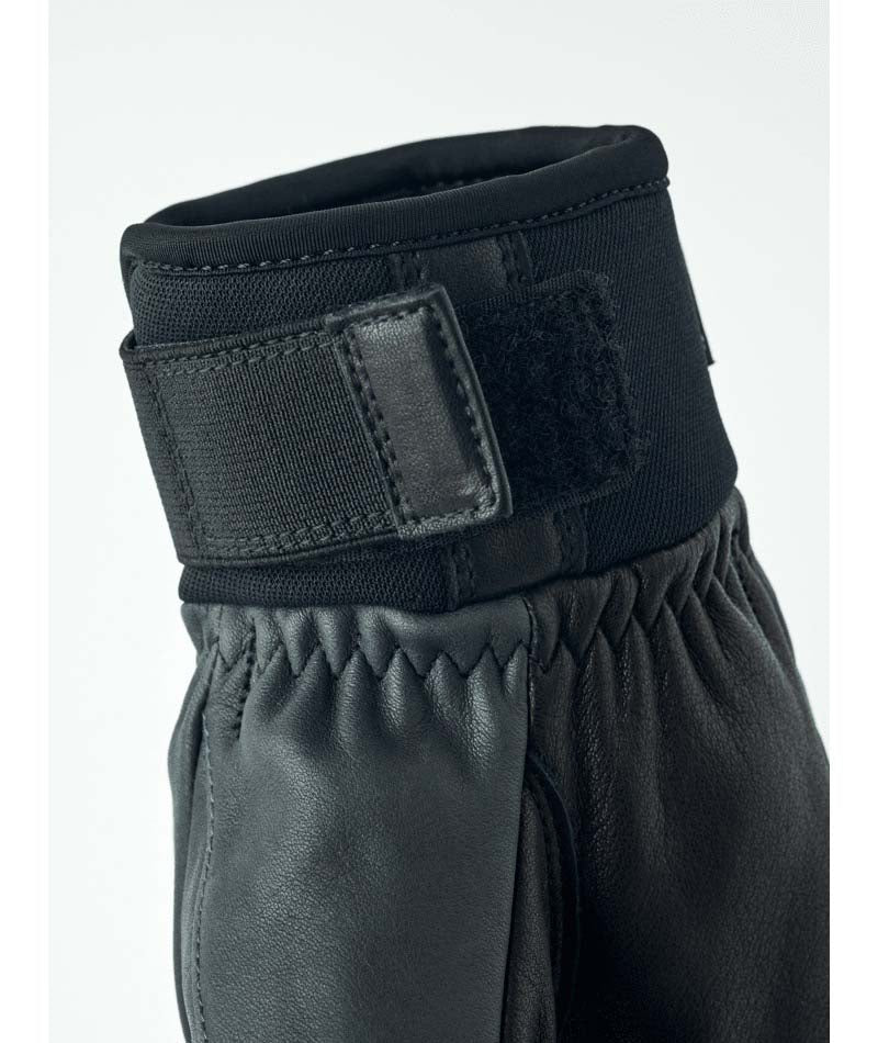 OmniTriggerGlove-A pair of black leather winter gloves shown against a plain white background