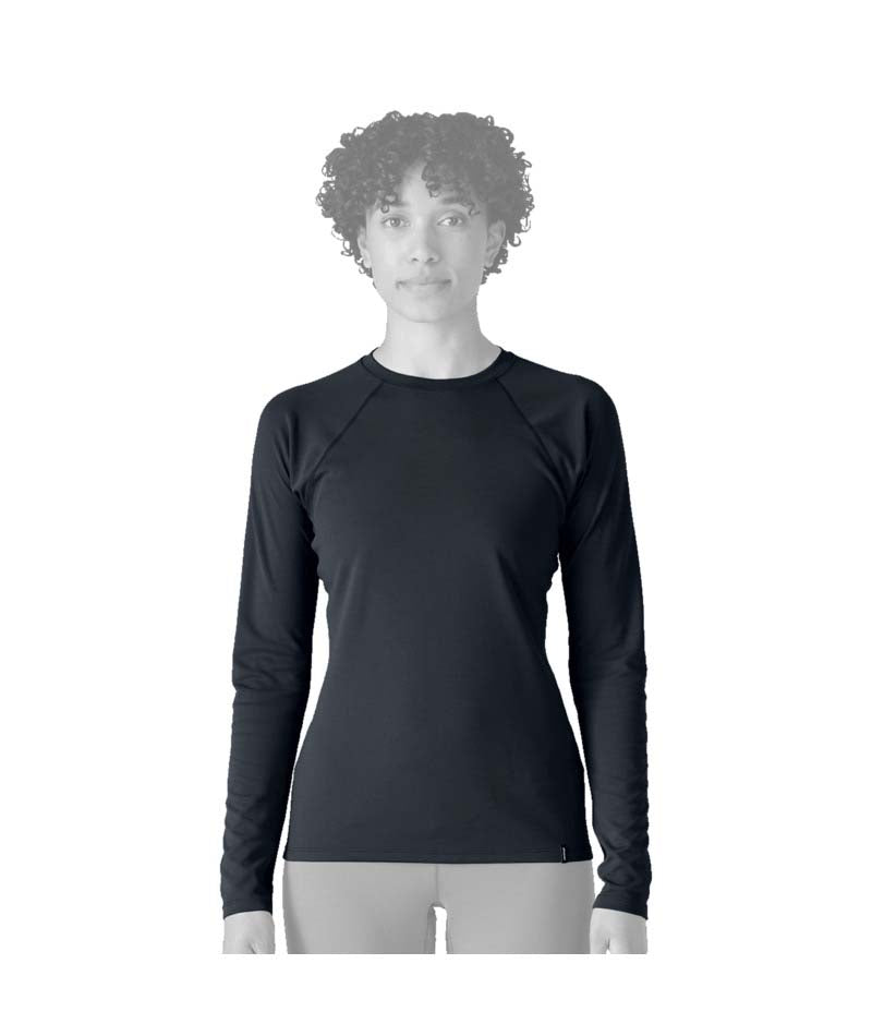 Patagonia Capilene Midweight Womens Crew- Person wearing a black long-sleeve shirt on a white background