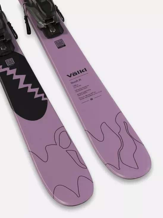 RevoltJrUrban-Pair of purple skis with bindings on a white background