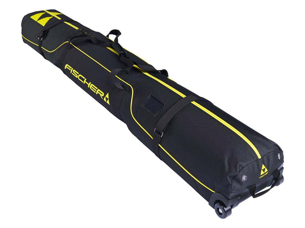 SKICASE2- A black Fischer ski bag with bright yellow accents, featuring a telescoping design, multiple zippered compartments, and a wheeled bottom, shown on a plain white background.