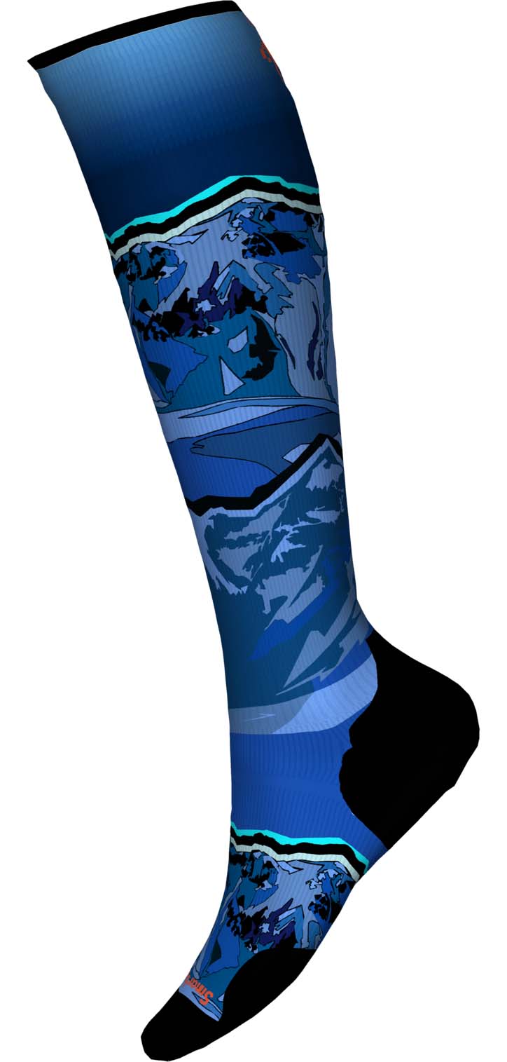 SkiTargetedCushionStormPeakPrintOTCSocks-Blue knee-high sock with mountain and landscape design on a white background