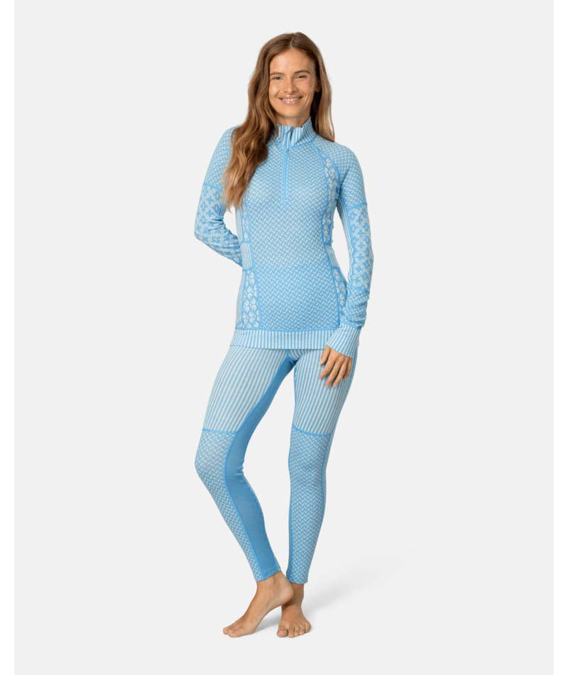 Smekker1_2ZipBaseLayer-Light blue sweater with intricate patterns on a white background