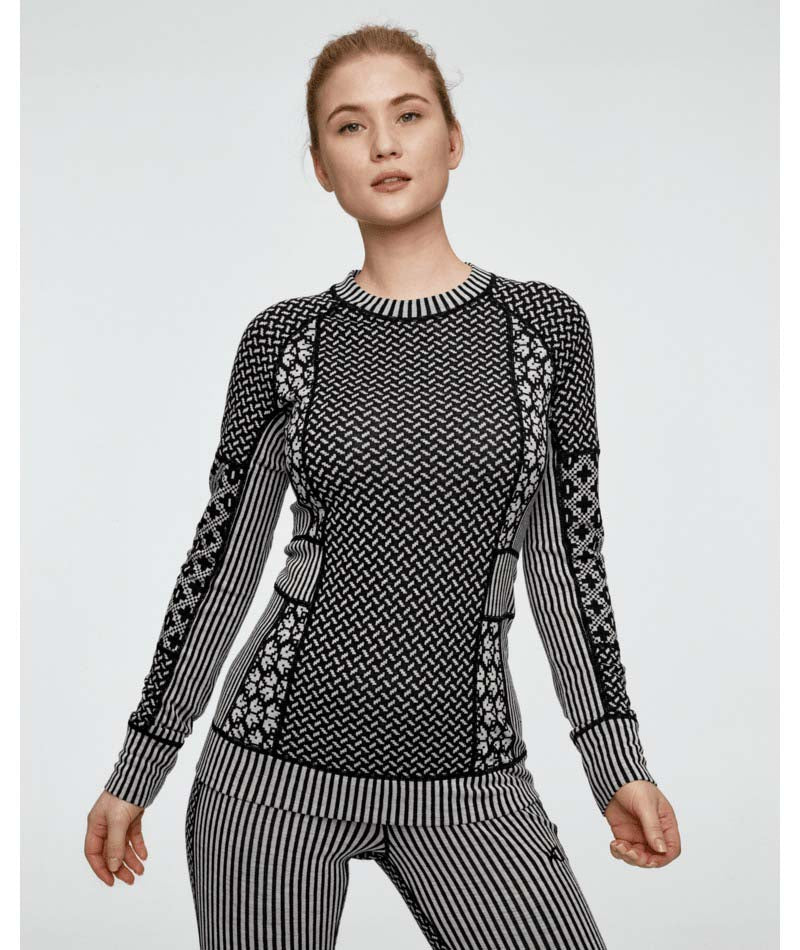 SmekkerLongSleeveBaseLayer-Black and white patterned sweater on a white background
