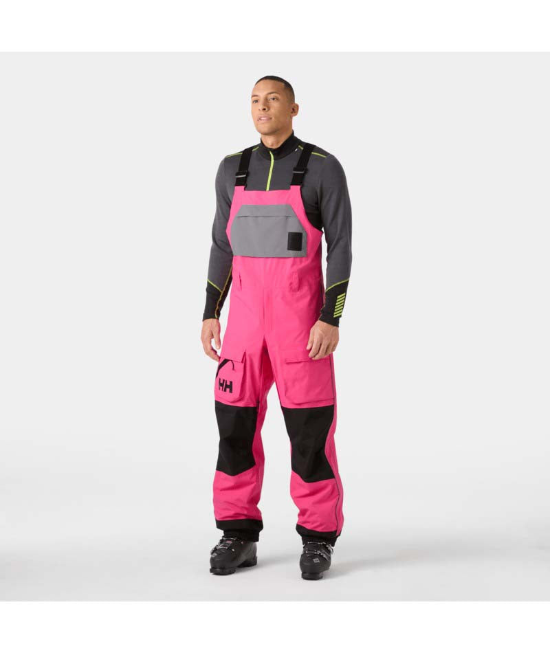 UllrDBibShellPant- Pink bib overalls with black accents on a white background