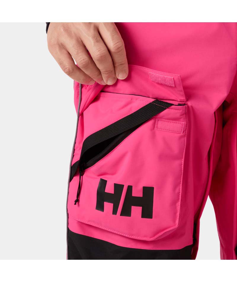 UllrDBibShellPant- Pink bib overalls with black accents on a white background