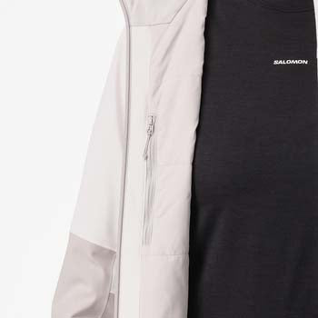 WHighlandInsulatedJacket-Person wearing a white ski jacket on a white background