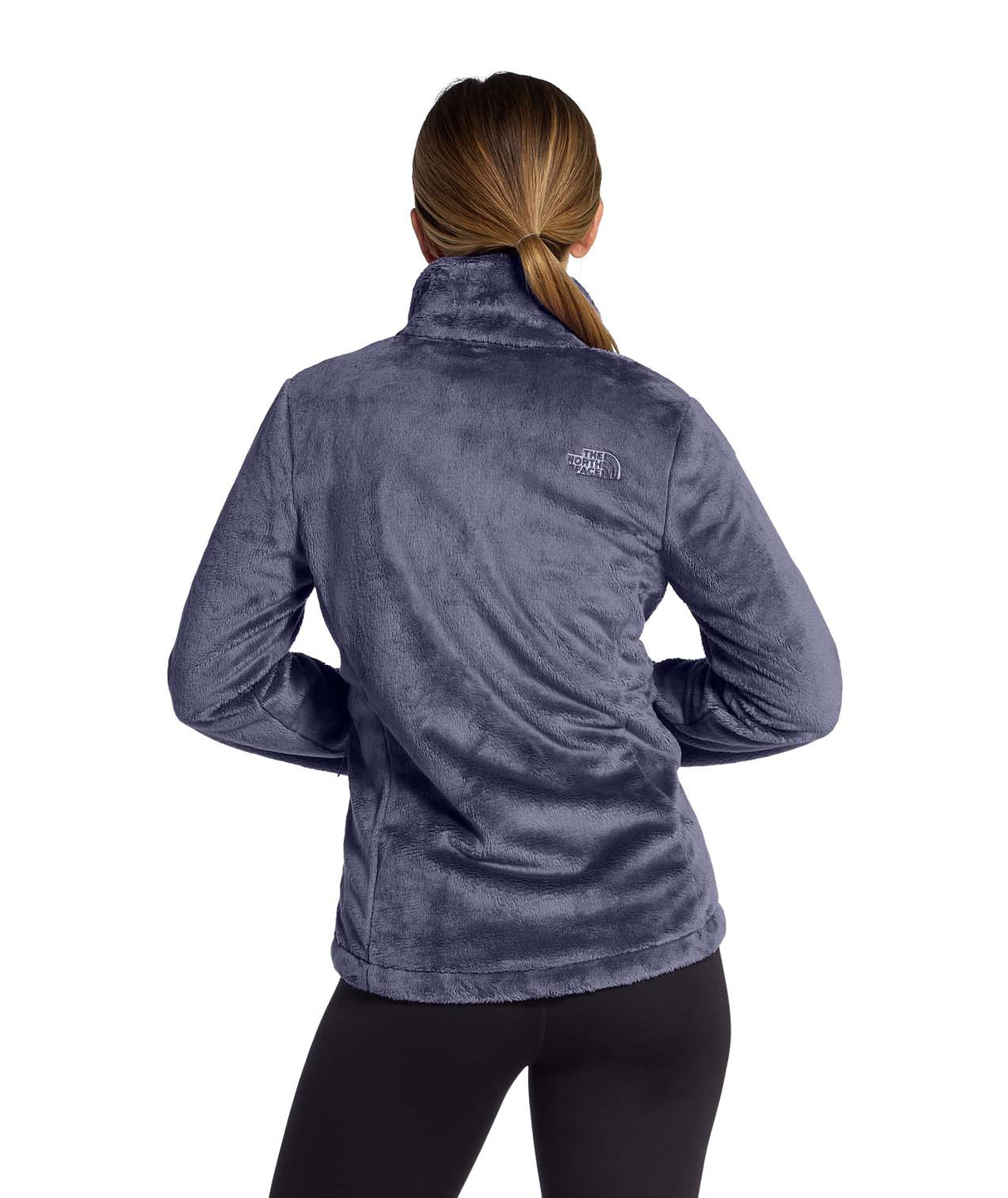 WOsitoJacket- Woman wearing a light purple full zip fleece jacket on a white background