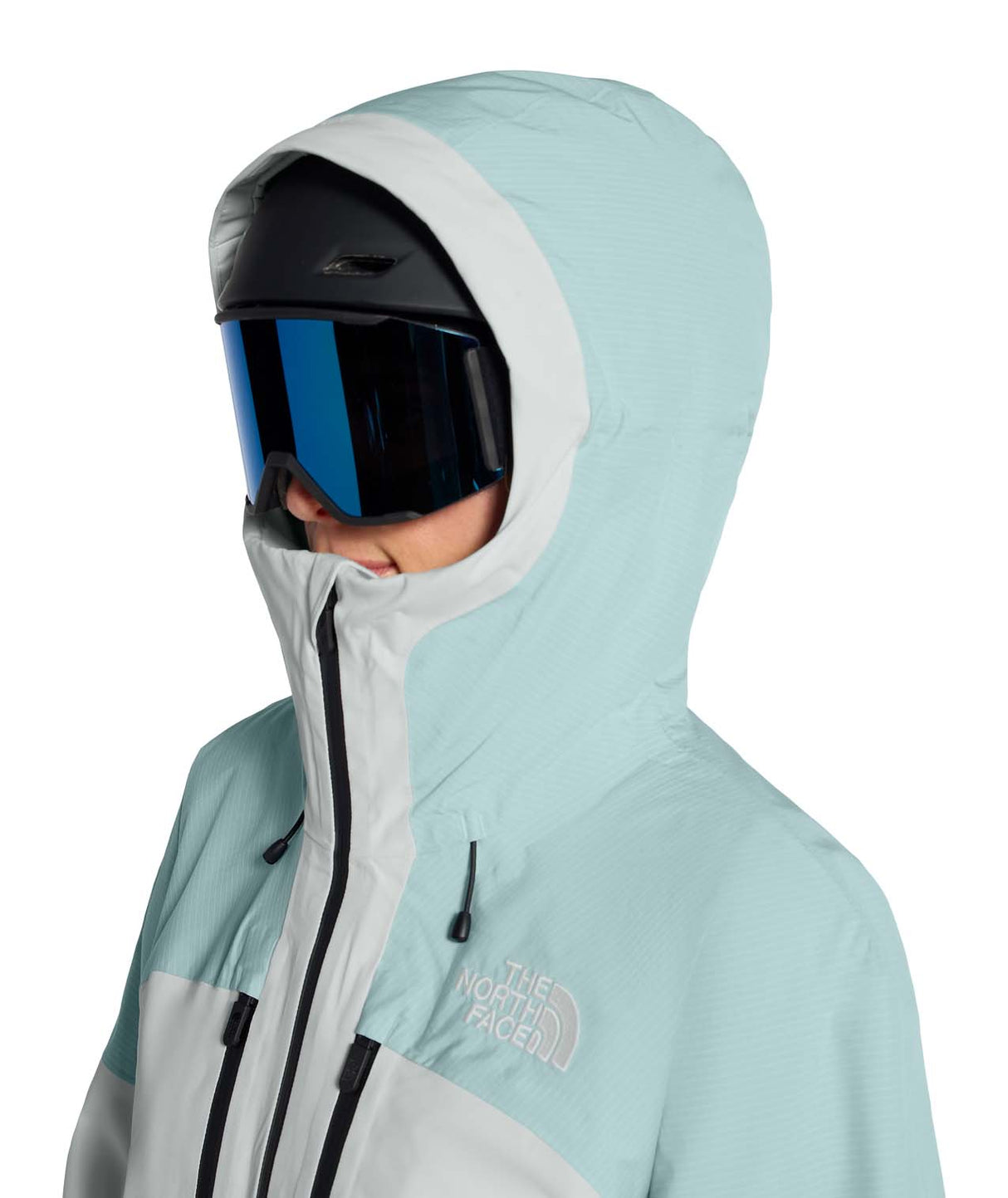 WPowstarJacket-Person wearing a light blue jacket with The North Face logo on a white background