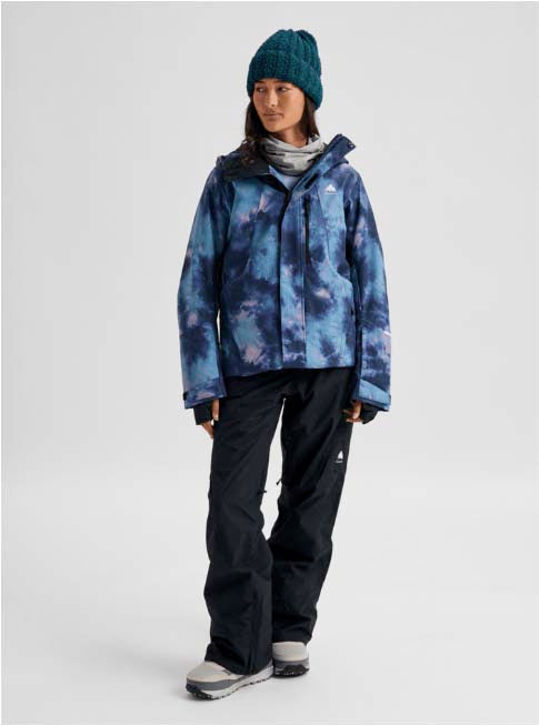 WReserve2LInsulatedStretchSlimJacket-Person wearing a blue tie-dye jacket and black pants on a white background
