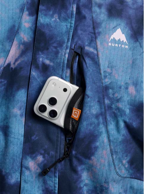 WReserve2LInsulatedStretchSlimJacket-Blue tie-dye jacket with a brand logo on a white background