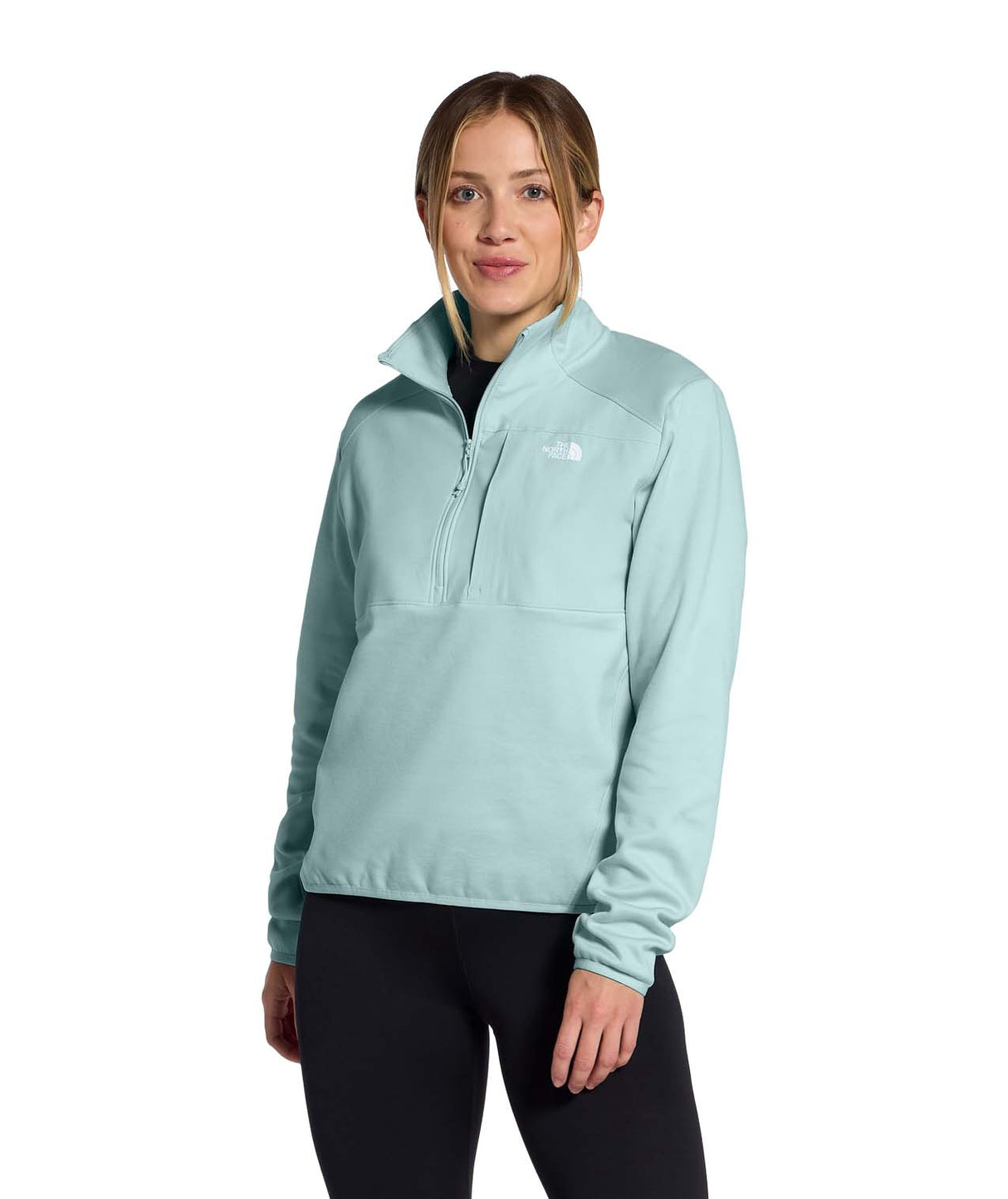 WTNFPerformanceFleece1_4Zip- Person wearing a light blue quarter zip with white North Face Logo on a white background
