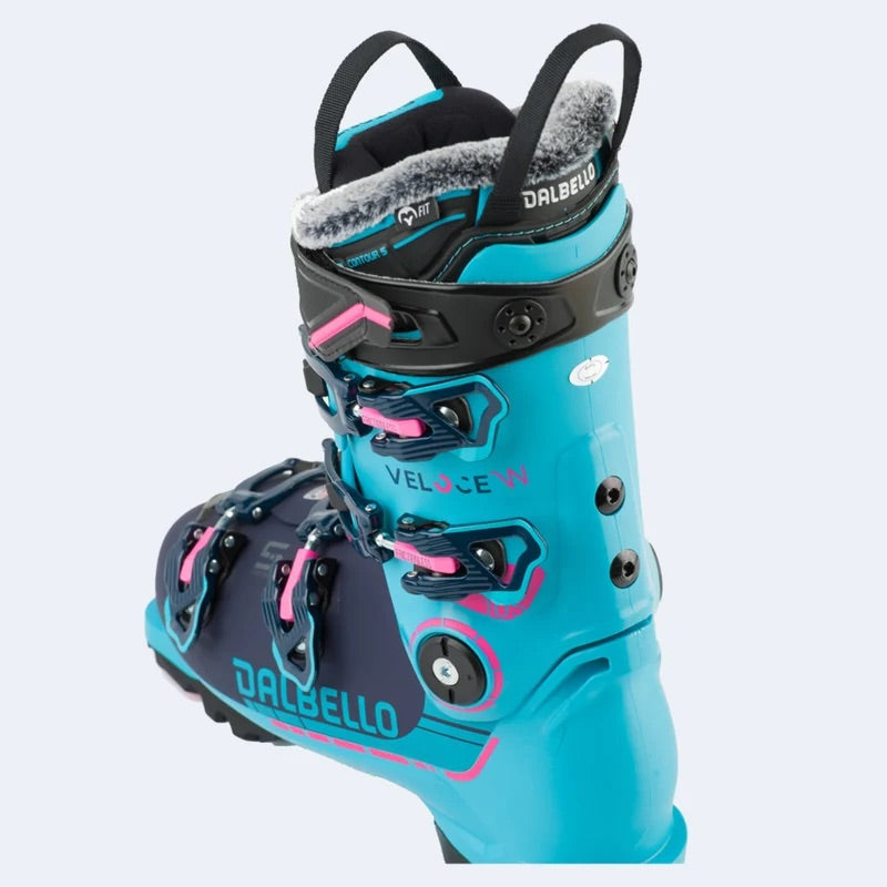 WVeloce105MV- A Dalbello ski boot in a vibrant turquoise and navy blue colorway, featuring pink accents on the buckles and straps, a black cuff, and a gray fleece lining.