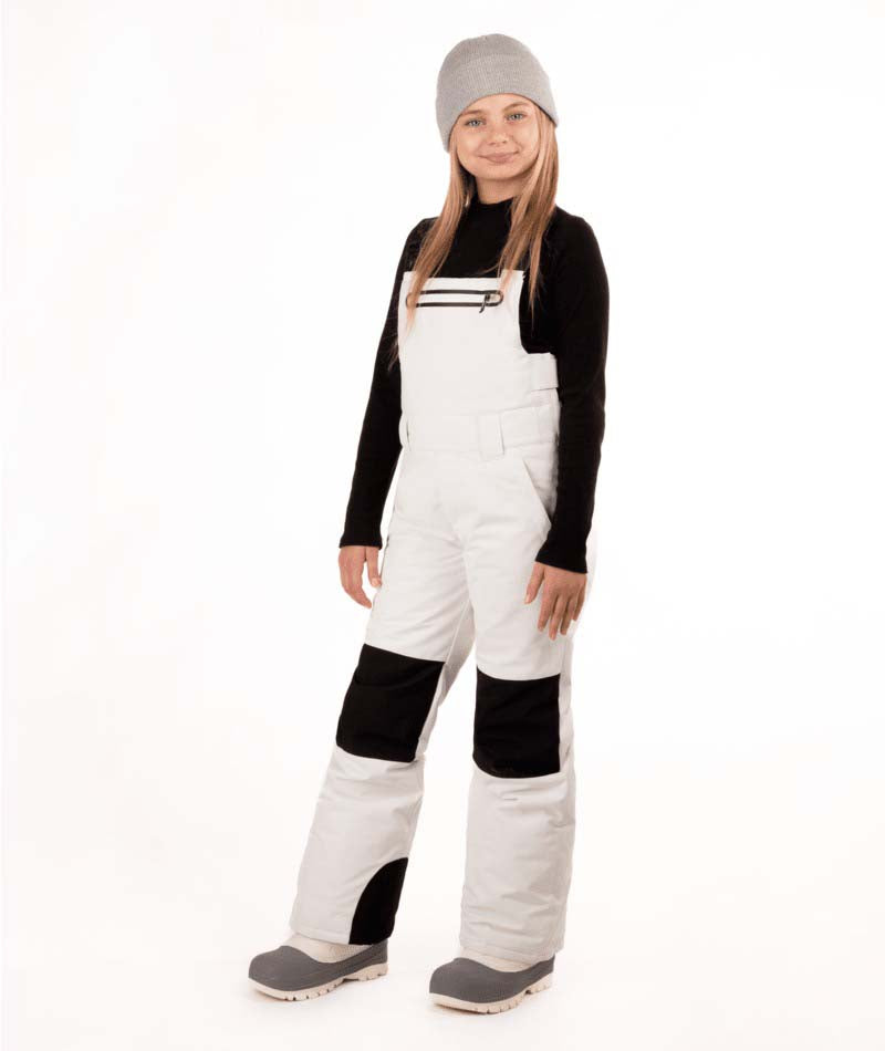 YouthCooperBib-Person wearing a black long-sleeve shirt, gray beanie, white bib overalls, and gray shoes on a white background
