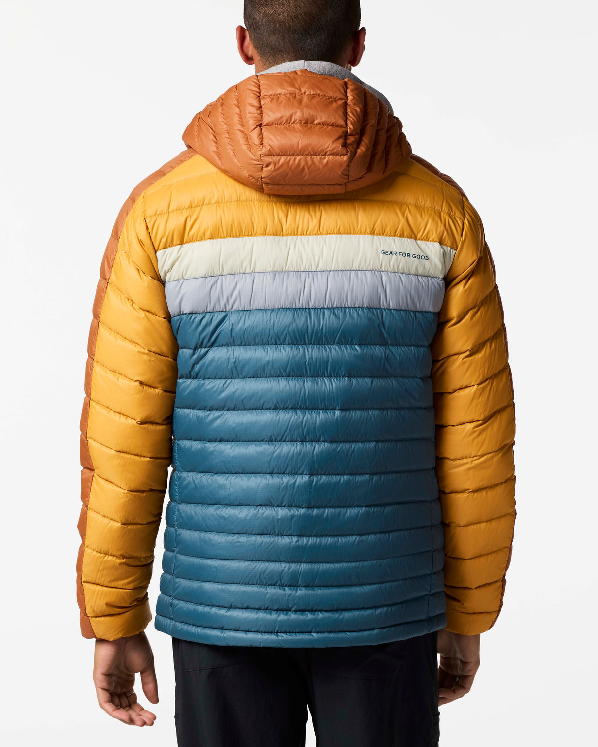 m-fuego-down-hooded-jacket- A hooded puffer jacket with a color-blocked design featuring a dark blue front, mustard yellow sides, and brown sleeves and hood, shown on a plain white background.